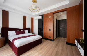 Spacious master bedroom with king-size bed